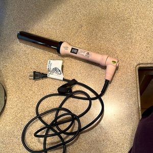 Lange titanium rose gold 1.25” beach waving curling iron